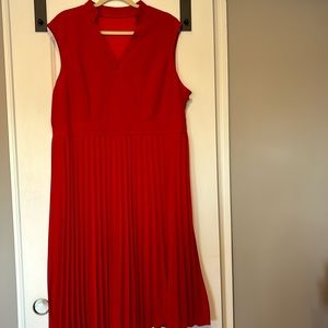 Sleeveless red pleated skirt dress